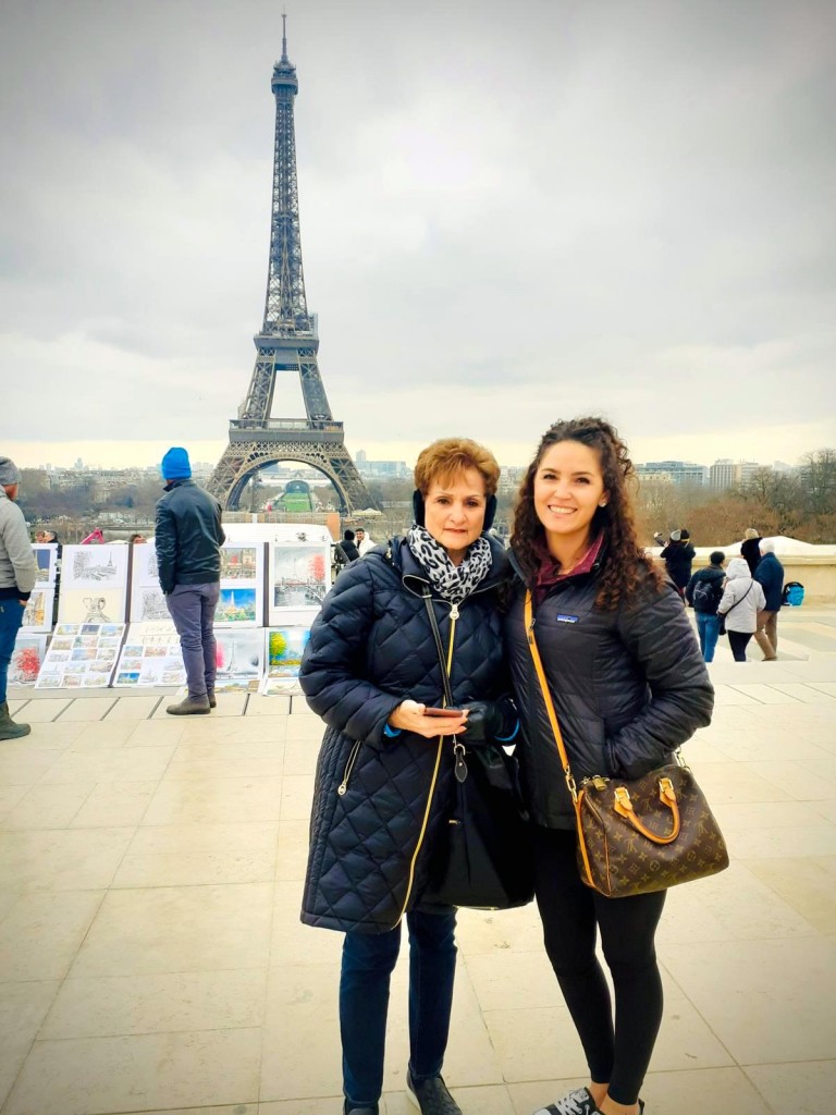 Paris Magical Tours Visitors Enjoying  the scenery at the Eiffel Tower 